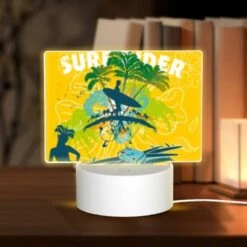 Rectangular Acrylic Night Light, A Woman Is Standing In Front Of A Surfboard
