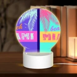 Round Acrylic Night Light, A Colorful Beach Sign That Says "Beach Miami.".