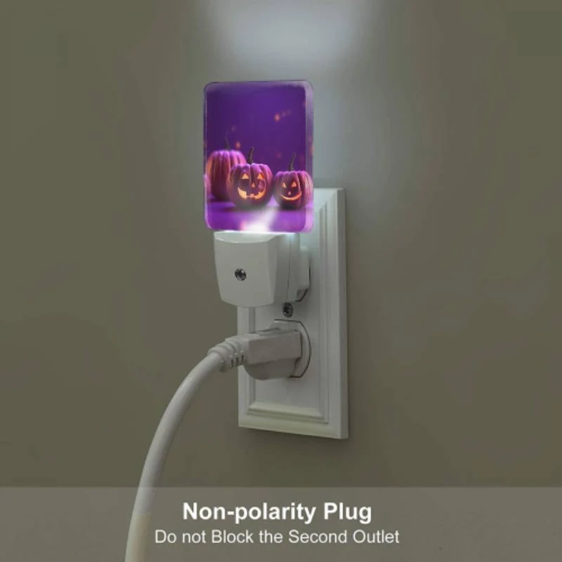 Night Light Set of 2, Two pumpkins with faces drawn on them sit on a purple background. Night Light Set Of 2, Two Pumpkins With Faces Drawn On Them Sit On A Purple Background. -Pattern Night Light 0b3a43651091facd4b6e08b3dafdd4e1e178a614