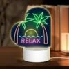 Love Acrylic Night Light, A Neon Sign That Says "Relax" With Palm Trees In The Background.