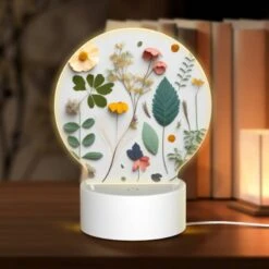 Round Acrylic Night Light, A Collection Of Different Flowers And Leaves.