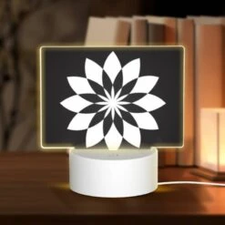 Rectangular Acrylic Night Light, A Black And White Flower Design.