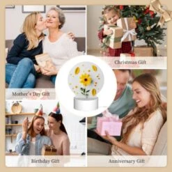 Round Acrylic Night Light, A Yellow Flower With Yellow Petals And Green Leaves Is Placed On A White Surface. 9 Round Acrylic Night Light, A Yellow Flower With Yellow Petals And Green Leaves Is Placed On A White Surface. -Pattern Night Light 1c417966719cf0816cf0b8939392ac551a040692