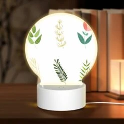 Round Acrylic Night Light, Six Different Types Of Plants Are Shown In A Row.