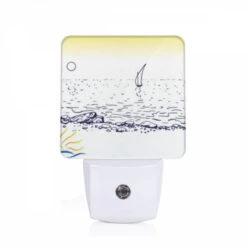 Night Light, A Sailboat Is Floating In The Ocean