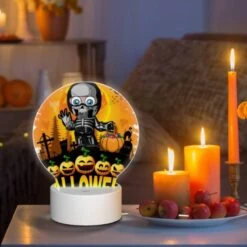 Round Acrylic Night Light, A Skeleton Is Holding A Pumpkin And A Bag Of Candy. 8 Round Acrylic Night Light, A Skeleton Is Holding A Pumpkin And A Bag Of Candy. -Pattern Night Light 3b4d96f9da511982fb1fc2c5da02b85a8eced3e9