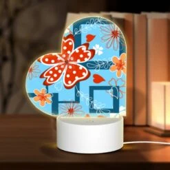 Love Acrylic Night Light, A Red Flower With White Polka Dots Is Surrounded By Other Flowers.