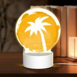 Round Acrylic Night Light, A Yellow Circle With A Palm Tree In It.
