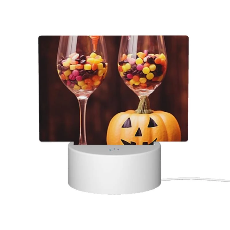 Rectangular Acrylic Night Light, A pumpkin is sitting next to two wine glasses filled with candy. Rectangular Acrylic Night Light, A Pumpkin Is Sitting Next To Two Wine Glasses Filled With Candy. -Pattern Night Light 3f48d3f9322d7615073991e8b8c243932a42db02