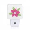Night Light, A Pink Flower With Green Leaves.