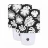 Night Light Set Of 2, A Pattern Of Palm Leaves On A Black Background. 2 Night Light Set Of 2, A Pattern Of Palm Leaves On A Black Background. -Pattern Night Light 483ffb6c8651aab8d495e086a7be34fe255d8fd1