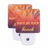 Night Light Set Of 2, A Colorful Beach Sign With The Words "Miami Beach" Written In Yellow. 2 Night Light Set Of 2, A Colorful Beach Sign With The Words "Miami Beach" Written In Yellow. -Pattern Night Light 4f451d4e6bfed5af12de811035c636c6801eb4ce