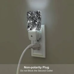 Night Light, A Close Up Of A Leafy Plant With A Black And White Background. 5 Night Light, A Close Up Of A Leafy Plant With A Black And White Background. -Pattern Night Light 513b4c76ad00bc33d0ae7452281bb8dd66dc07d3