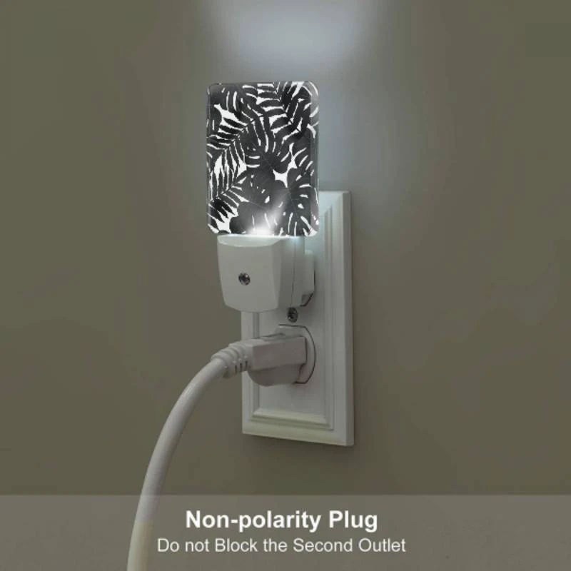 Night Light, A close up of a leafy plant with a black and white background. Night Light, A Close Up Of A Leafy Plant With A Black And White Background. -Pattern Night Light 513b4c76ad00bc33d0ae7452281bb8dd66dc07d3