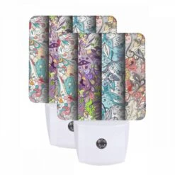 Night Light Set Of 2, Three Colorful Designs Are Displayed On A Wall.