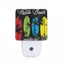 Night Light, A Black And White Image Of A Surfboard With The Words Florida Beach Paradise Lost Written On It.