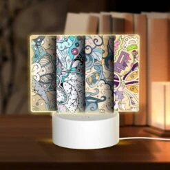 Rectangular Acrylic Night Light, Three Colorful Designs Are Displayed Side By Side.