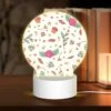 Round Acrylic Night Light, A Pattern Of Flowers And Stars With A Pink Rose In The Center. 2 Round Acrylic Night Light, A Pattern Of Flowers And Stars With A Pink Rose In The Center. -Pattern Night Light 6716bd756611173abbdfdc701b2aa5e9316f4dc0