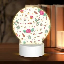 Round Acrylic Night Light, A Pattern Of Flowers And Stars With A Pink Rose In The Center.