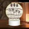 Round Acrylic Night Light, A Picture Of Palm Trees With The Word Goa Written Above It.
