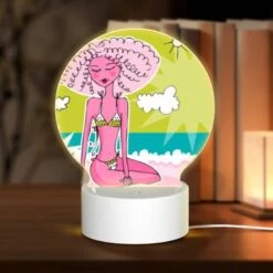 Round Acrylic Night Light, A Cartoon Woman With Pink Hair And A Bikini Sits On A Beach.