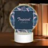 Round Acrylic Night Light, A Tropical Leaves Design With A Pink And Blue Color Scheme. 1 Round Acrylic Night Light, A Tropical Leaves Design With A Pink And Blue Color Scheme. -Pattern Night Light 7158ef31536a9ebfd25043021e861f18a1a3046c