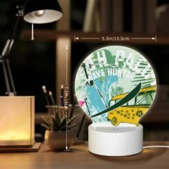 Round Acrylic Night Light, A Surfboard With A Skeleton On It Is Next To A Bus. 7 Round Acrylic Night Light, A Surfboard With A Skeleton On It Is Next To A Bus. -Pattern Night Light 7bac8b86a8d42444e9b74a6281eda12ac58b3893