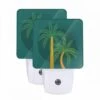 Night Light Set Of 2, A Green And Yellow Palm Tree With A Globe In The Background.