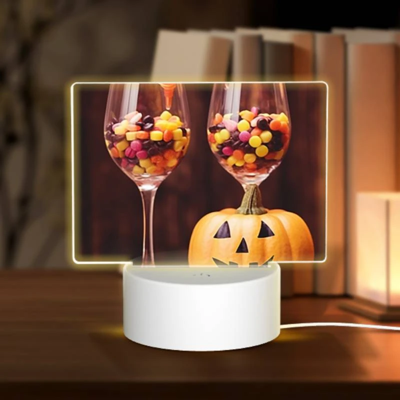 Rectangular Acrylic Night Light, A pumpkin is sitting next to two wine glasses filled with candy. Rectangular Acrylic Night Light, A Pumpkin Is Sitting Next To Two Wine Glasses Filled With Candy. -Pattern Night Light 89cbccb7f013aa5de3732bffc19fe0a961246bd2