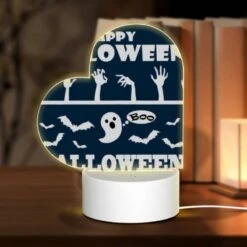 Love Acrylic Night Light, A Poster With A Ghost And The Words "Happy Halloween" On It.