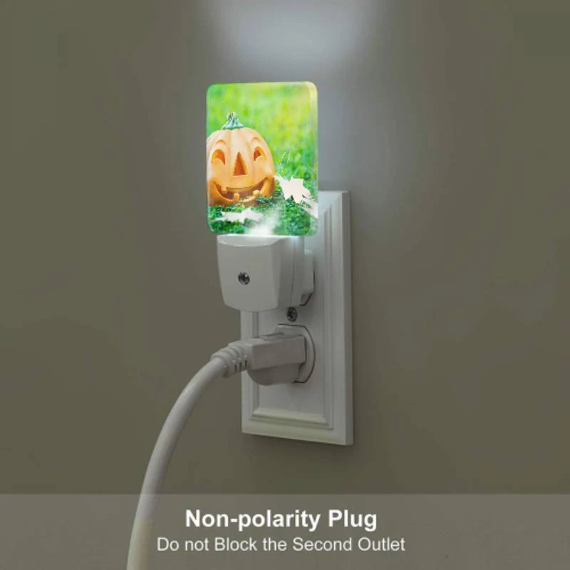 Night Light, A fake pumpkin with a smile on it sits on the grass. Night Light, A Fake Pumpkin With A Smile On It Sits On The Grass. -Pattern Night Light 9c8605724913813450c0b3fce5adc76be50d55b0