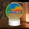 Round Acrylic Night Light, A Sunset Over The Ocean With Palm Trees In The Foreground. 2 Round Acrylic Night Light, A Sunset Over The Ocean With Palm Trees In The Foreground. -Pattern Night Light 9fccb0e8b8c6e0a87bed2dee859c0f446a21edcf