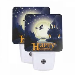 Night Light Set Of 2, A Witch On A Broom Flies Over A Castle During A Halloween Celebration.