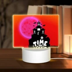 Rectangular Acrylic Night Light, A Spooky House With A Pumpkin On Top And A Skeleton On The Side.