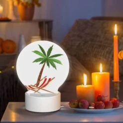 Round Acrylic Night Light, A Palm Tree Is Shown In A Red And White Striped Chair. 8 Round Acrylic Night Light, A Palm Tree Is Shown In A Red And White Striped Chair. -Pattern Night Light baf0328a1a423f58848f91b1af7e0f00bdfab2cd