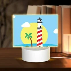 Rectangular Acrylic Night Light, A Lighthouse Stands On A Small Island In The Ocean.