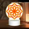 Round Acrylic Night Light, A Colorful Orange Flower With A Yellow Center.