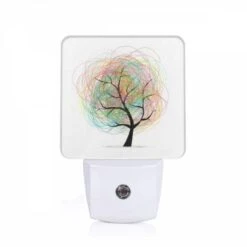 Night Light, A Tree With Many Branches And A Few Leaves.