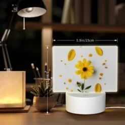 Rectangular Acrylic Night Light, A Yellow Flower With Yellow Petals And Green Leaves Is Placed On A White Surface. 7 Rectangular Acrylic Night Light, A Yellow Flower With Yellow Petals And Green Leaves Is Placed On A White Surface. -Pattern Night Light e3711d29358703f9ec8da591fa64d82e159b5439