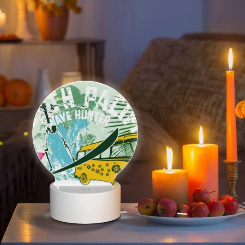 Round Acrylic Night Light, A surfboard with a skeleton on it is next to a bus. Round Acrylic Night Light, A Surfboard With A Skeleton On It Is Next To A Bus. -Pattern Night Light e69bbedeaa421b918e6b49b476ad951d3359930a