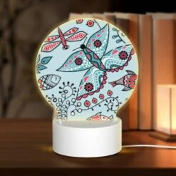 Round Acrylic Night Light, A Colorful Butterfly Is Surrounded By Other Colorful Butterflies And Fish.