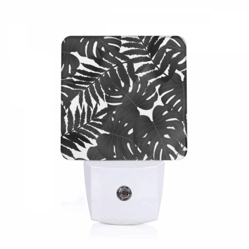 Night Light, A close up of a leafy plant with a black and white background. Night Light, A Close Up Of A Leafy Plant With A Black And White Background. -Pattern Night Light ea4846c5964ddbb7496a3696da37b77dbd0ce8c2