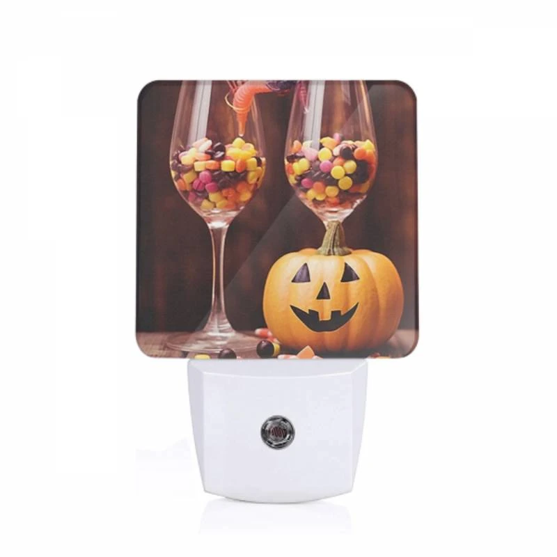 Night Light, A pumpkin is sitting next to two wine glasses filled with candy. Night Light, A Pumpkin Is Sitting Next To Two Wine Glasses Filled With Candy. -Pattern Night Light ef2e2ba3624677b21abfebc6b20b4a9990d6318e