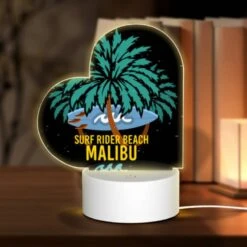 Love Acrylic Night Light, A Surfboard Is Floating On A Wave In Front Of A Palm Tree.