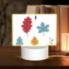 Rectangular Acrylic Night Light, Six Different Colored Leaves Are Shown In A Row. 1 Rectangular Acrylic Night Light, Six Different Colored Leaves Are Shown In A Row. -Pattern Night Light f69a7c5a071eb304c1bea6d644d804fdcc566876