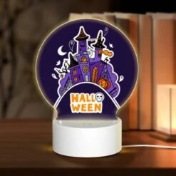 Round Acrylic Night Light, A Halloween Poster With A Castle And A Witch.